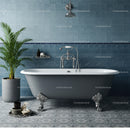 Vintage clawfoot bathtub in stylish blue tiled bathroom