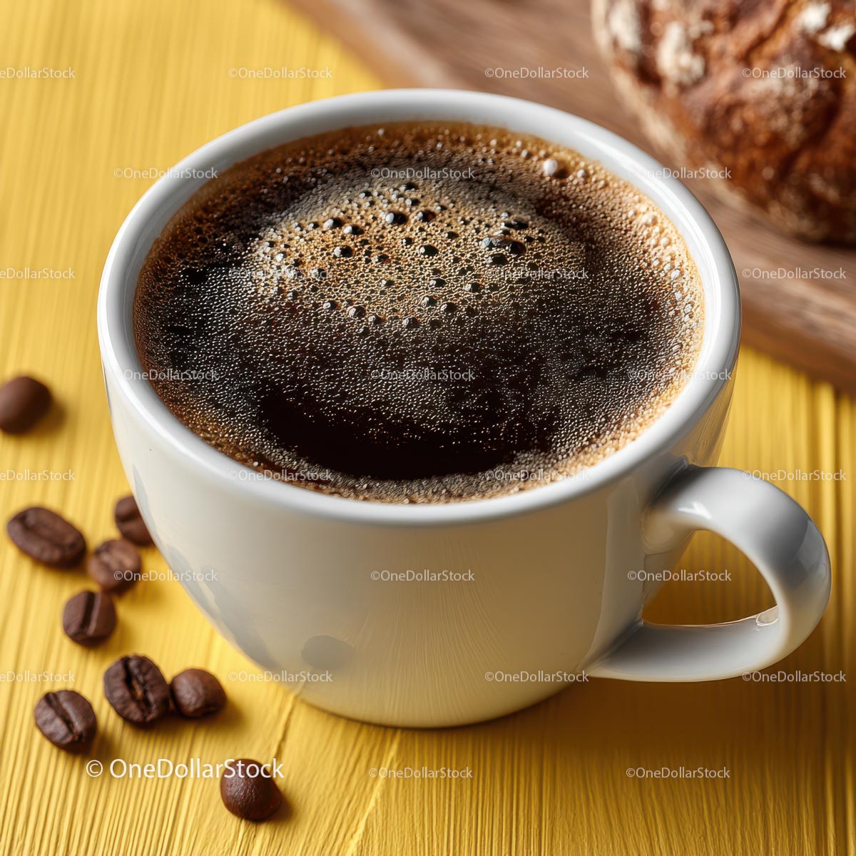 Steaming Cup of Black Coffee with Coffee Beans on a Yellow Background
