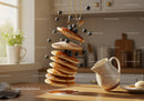 Stack of pancakes with honey and fresh blueberries