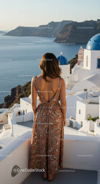 Woman enjoying serene sea view in Santorini Greece
