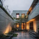 Modern Concrete House with Elegant Nighttime Courtyard and Lighting