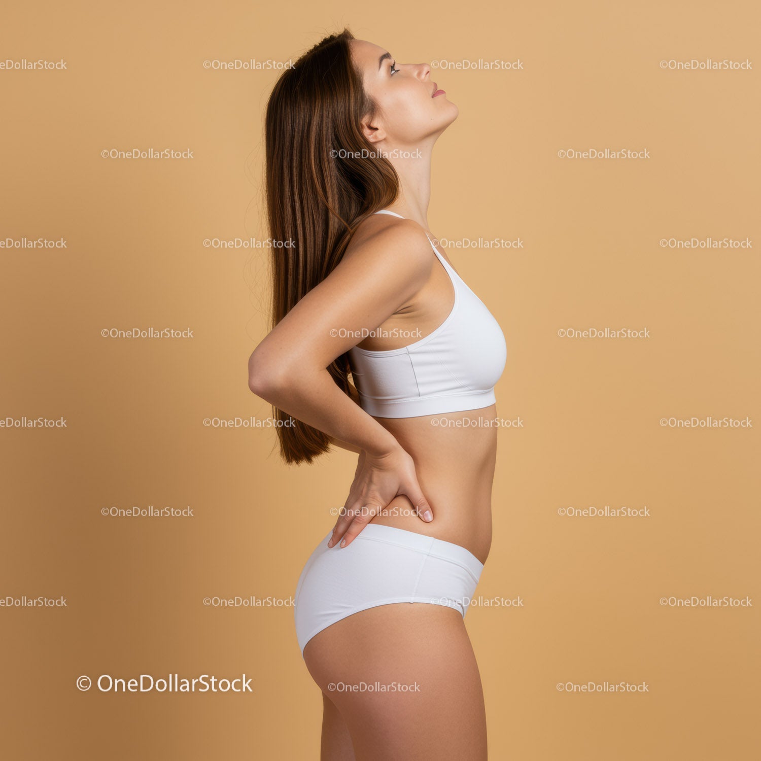 Young Woman in White Sportswear Showing Confident and Fit Profile