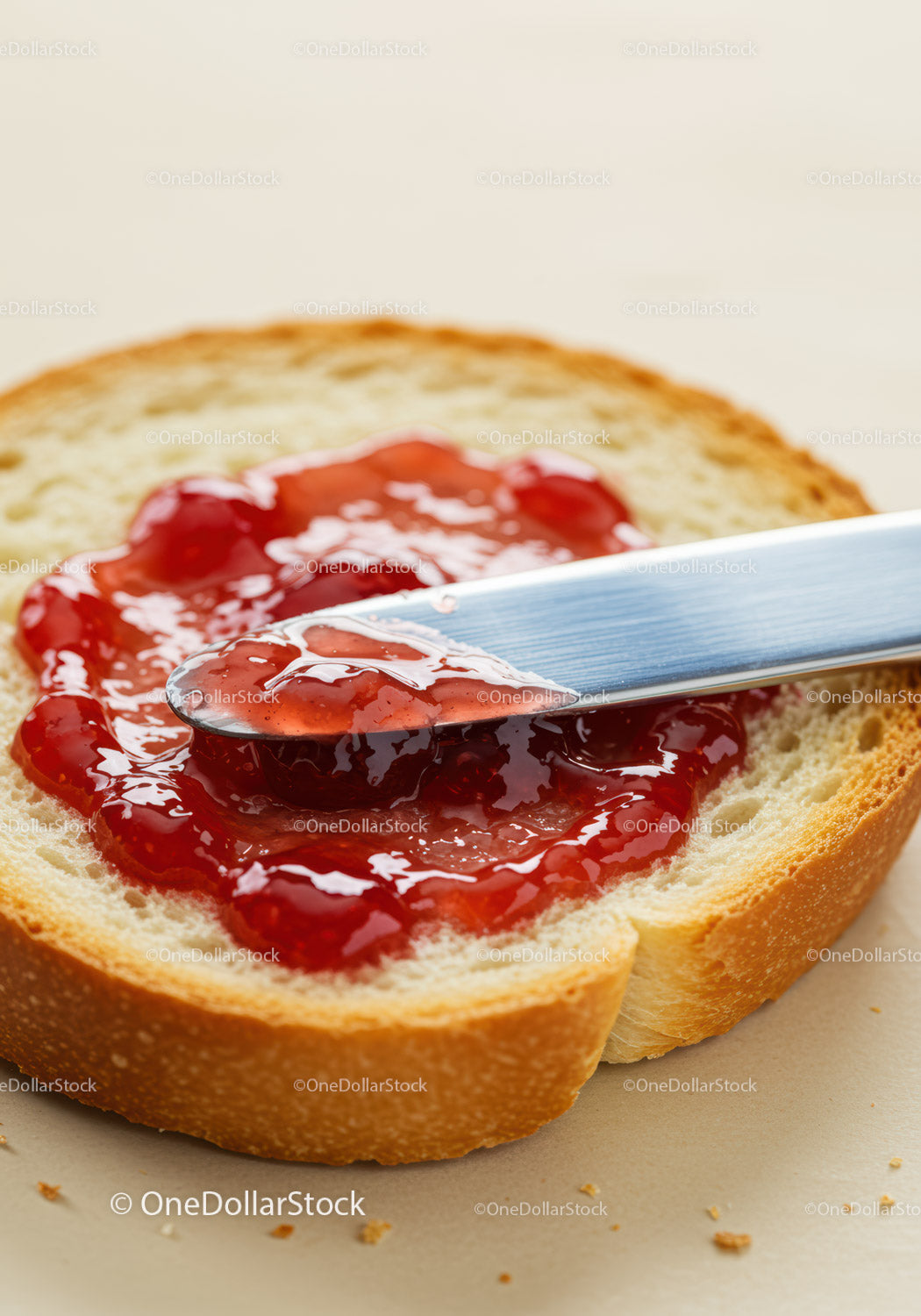Fresh Bread Slice with Glossy Strawberry Jam Spread