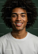 Portrait of Happy Young Man with Curly Hair and Bright Smile