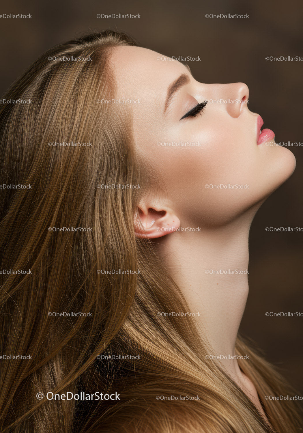 Profile of young woman with smooth skin and long hair