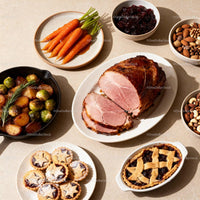Holiday meal with glazed ham and festive sides