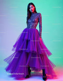 Elegant Woman in Purple Tulle Gown with Artistic Colorful Background