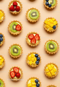 Colorful mini fruit tarts with kiwi strawberry mango