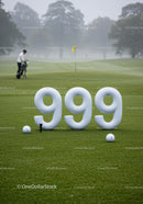 Golf course with oversized golf ball score numbers 999