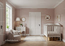 Bright Modern Nursery Room with Baby Crib and Wall Decorations