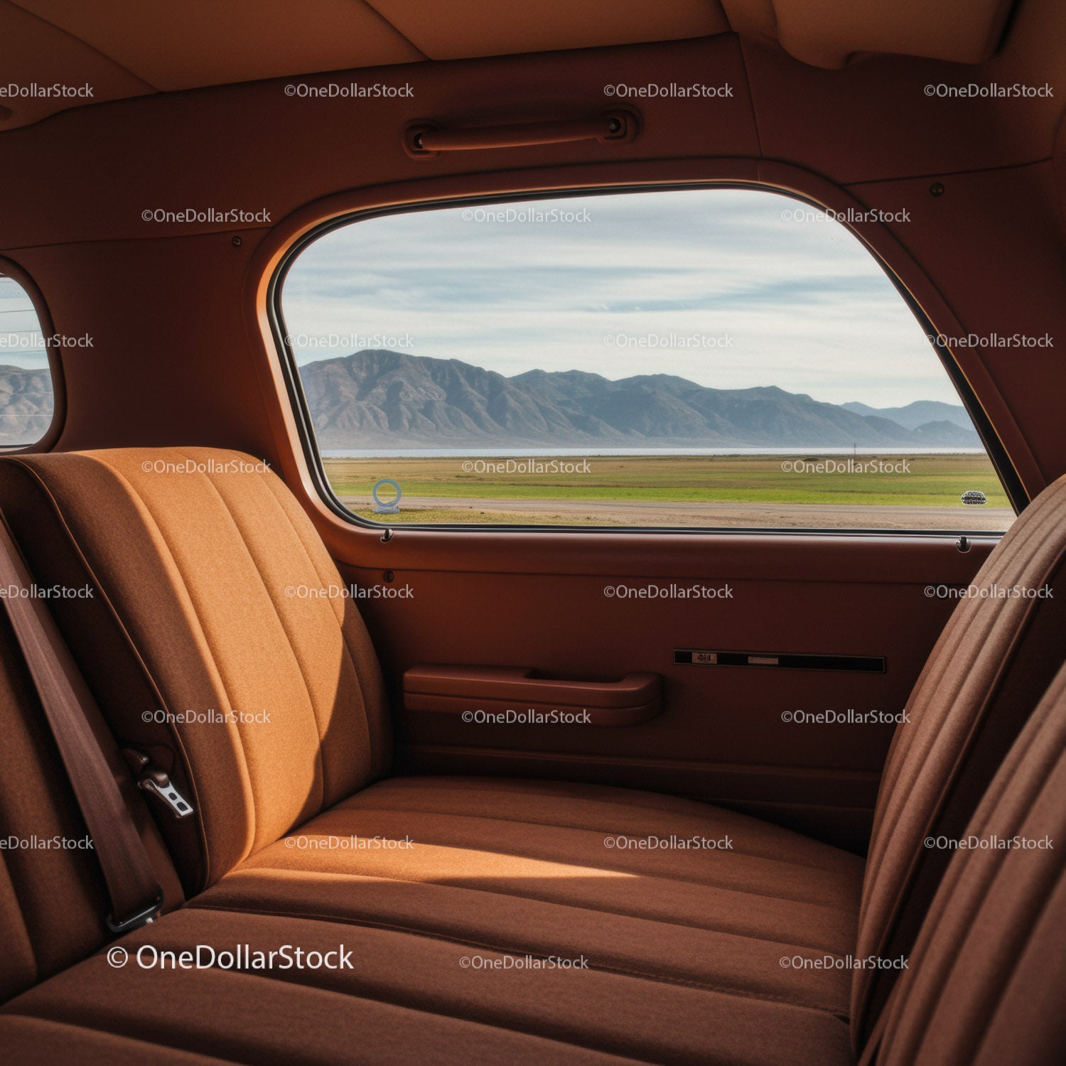 Vintage Car Interior with Scenic Mountain View through Panoramic Window