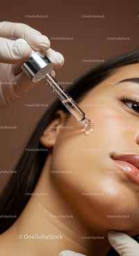 Close-up of Serum Application on Female Face During Skincare Routine
