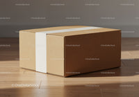 Closed cardboard box with white label on wooden floor
