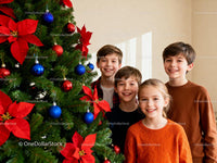Smiling Children Standing by Decorated Christmas Tree