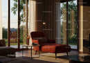 Cozy modern living room with red chaise lounge and natural light