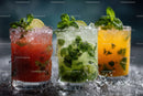 Assorted Refreshing Fruit Cocktails with Mint and Lime Garnish