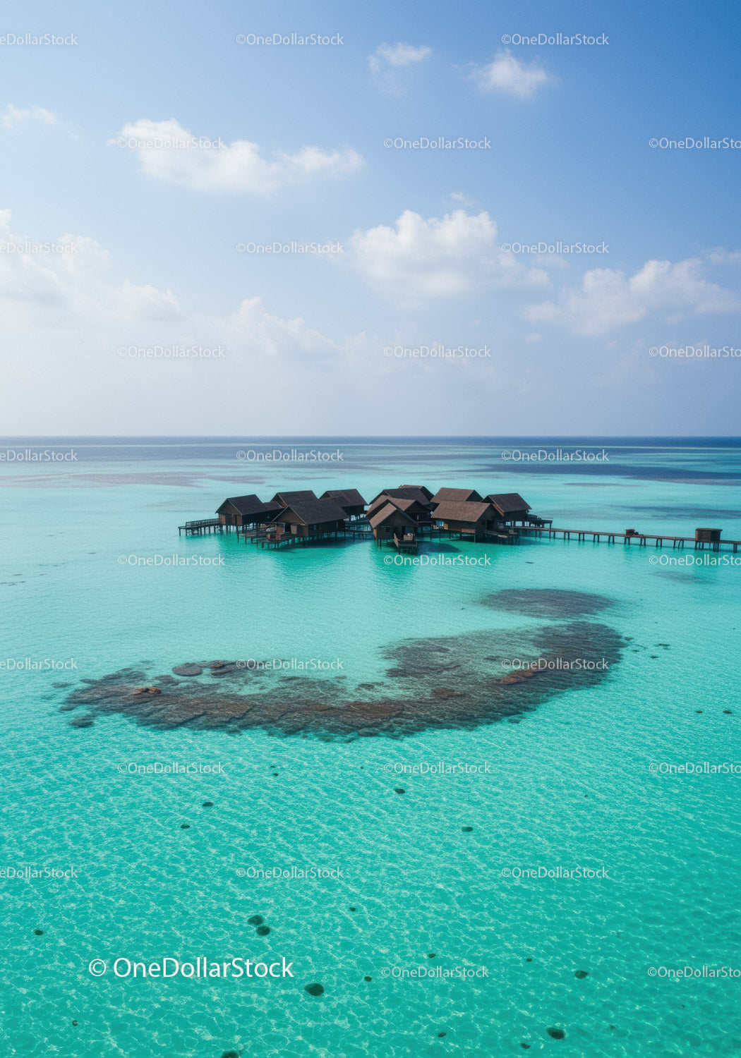 Luxury Overwater Bungalows with Turquoise Lagoon and Wooden Pier