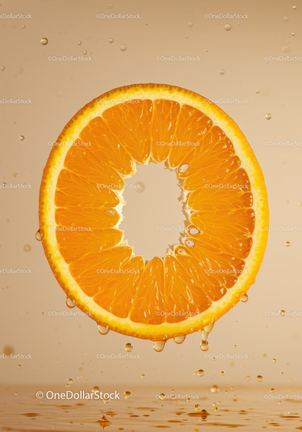 Juicy orange slice with water droplets on beige background