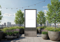 Blank billboard on urban rooftop with green plants