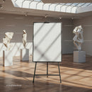 Minimalist art gallery interior with blank canvas easel