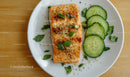Fresh Baked Salmon Fillet with Cucumber Slices and Herbs
