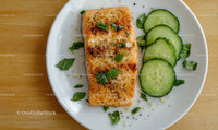 Fresh Baked Salmon Fillet with Cucumber Slices and Herbs