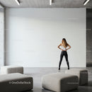 Woman standing confidently in modern minimalist space