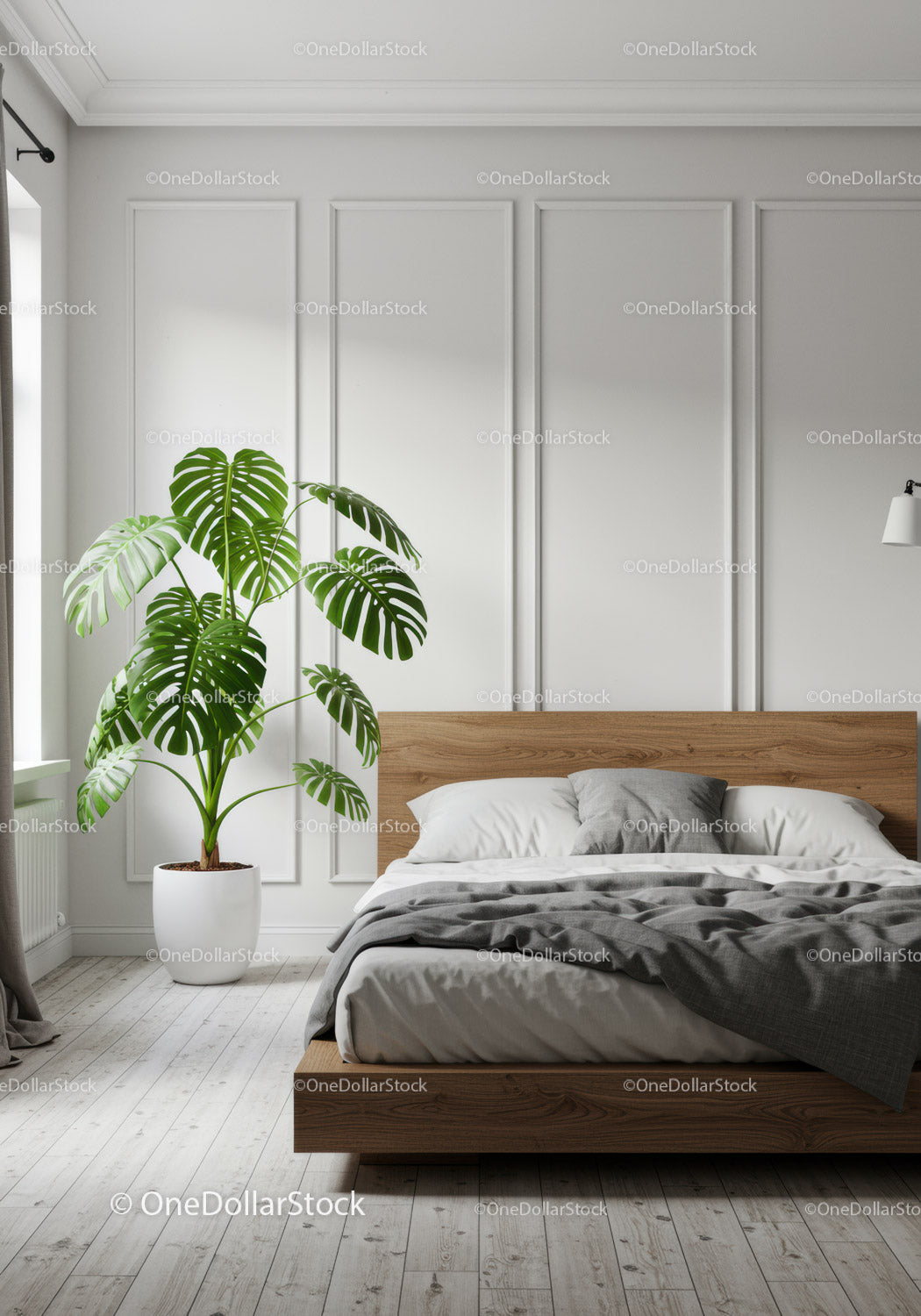 Nowoczesna minimalistyczna sypialnia z rośliną Monstera i drewnianą ramą łóżka