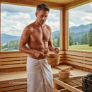 Man Relaxing in Sauna with Wooden Buckets in Scenic Mountain Environment