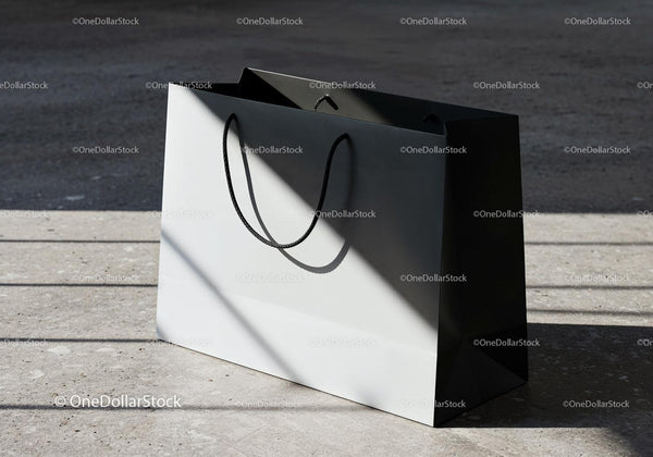 Minimalist white and black shopping bag in sunlight JPG Mockup Image