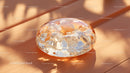 Luxurious Golden Glass Gemstone with Sparkling Glitter in Sunlight