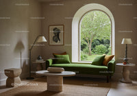 Minimalist living room with green sofa and garden view
