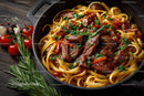 Beef and Mushroom Pasta in a Cast Iron Skillet with Cherry Tomatoes