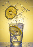 Refreshing Lemon Slice Splashing into Water Glass