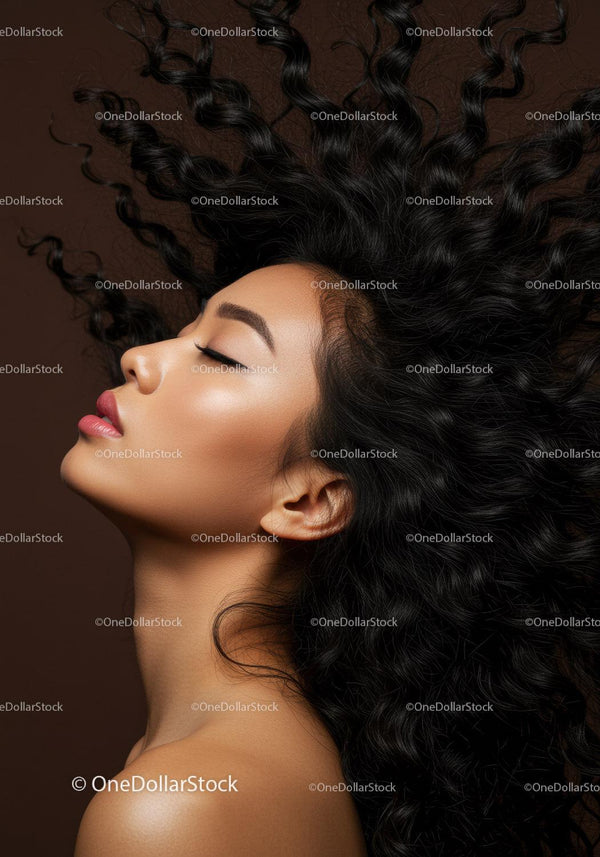 Profile of serene woman with flowing curly hair