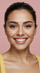 Close-up of smiling woman with flawless skin