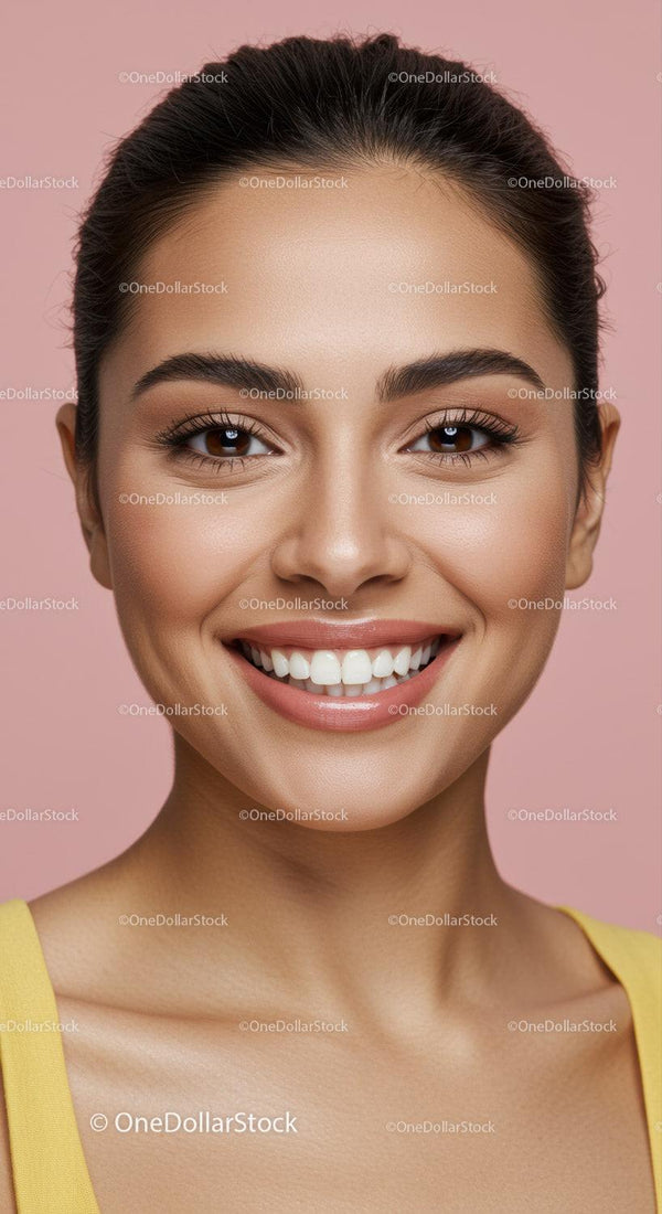 Close-up of smiling woman with flawless skin