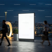 Illuminated Urban Billboard at Night with People Passing By