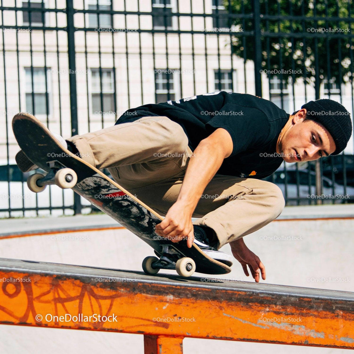 Young Skater Performing Trick on Urban Rail