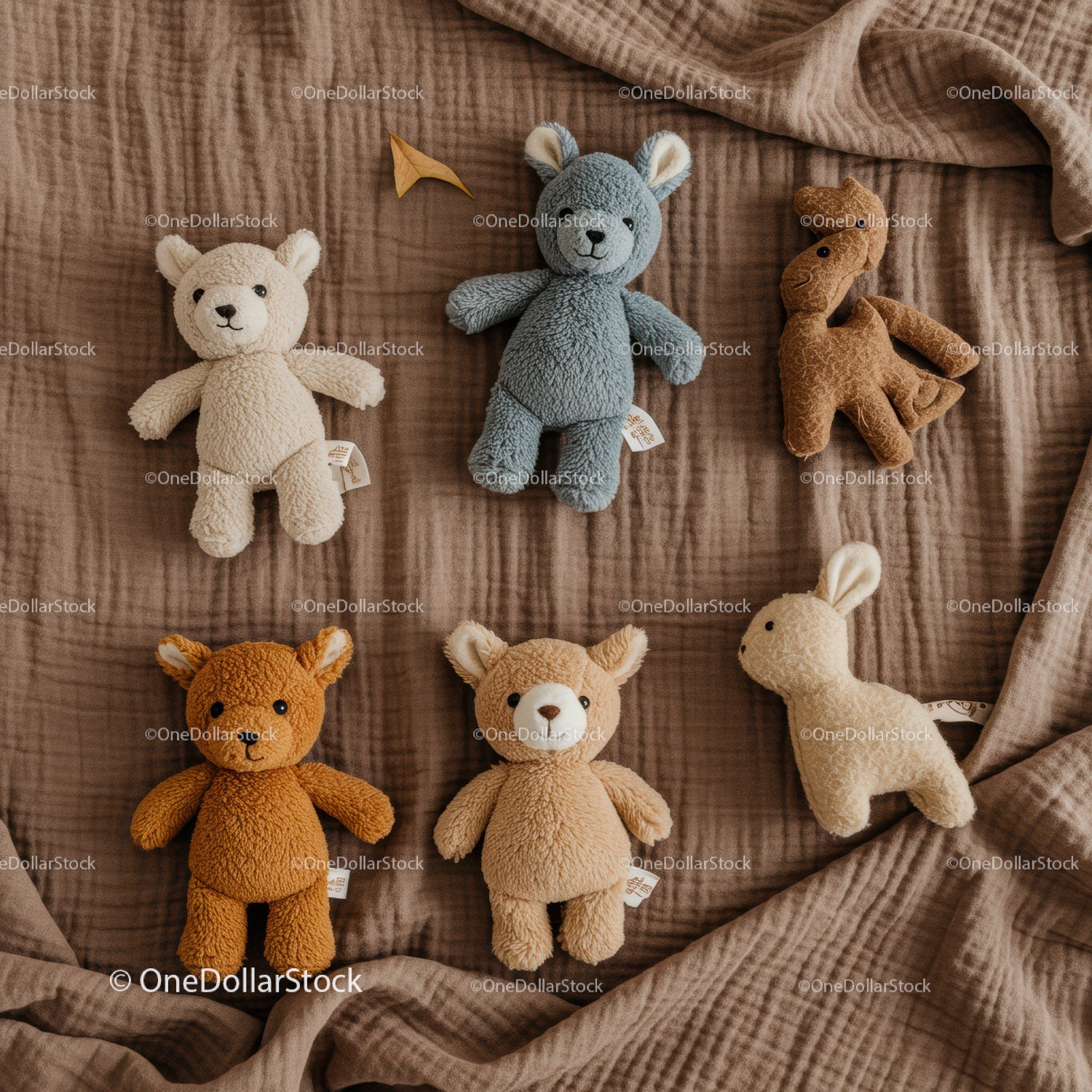 Soft Plush Animal Toys Arranged on Brown Fabric