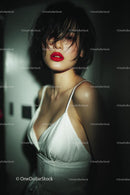 Elegant Woman with Red Lips in Stylish Evening Dress