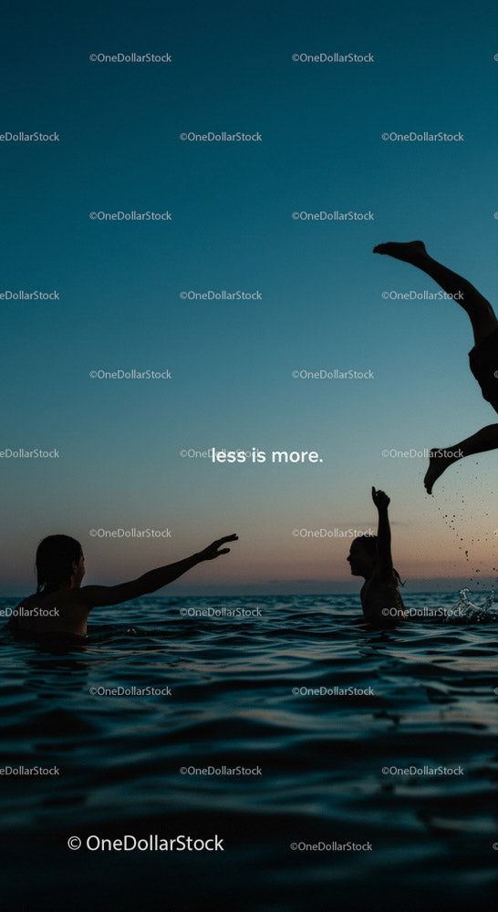 Playful Moments in the Water at Sunset