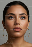 Close-Up Portrait of Elegant Woman with Brown Eyes and Hoop Earrings