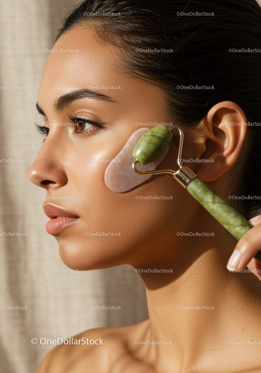 Young Woman Using Jade Roller for Facial Skincare