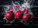 Fresh Beetroot Slicing with Water Splash in Vibrant Colorful Scene