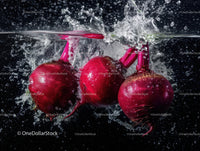 Fresh Beetroot Slicing with Water Splash in Vibrant Colorful Scene
