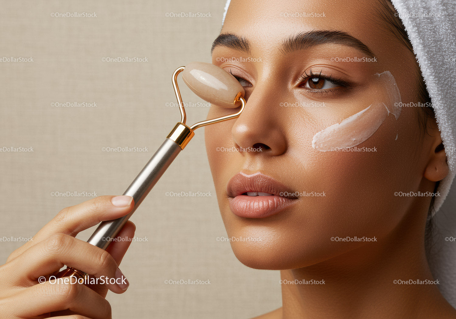 Close-up of a Woman Using Jade Roller for Facial Skin Care