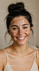 Young Woman Smiling with Facial Skin Treatment in Spa Setting