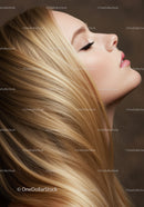 Side profile of woman with long flowing blonde hair