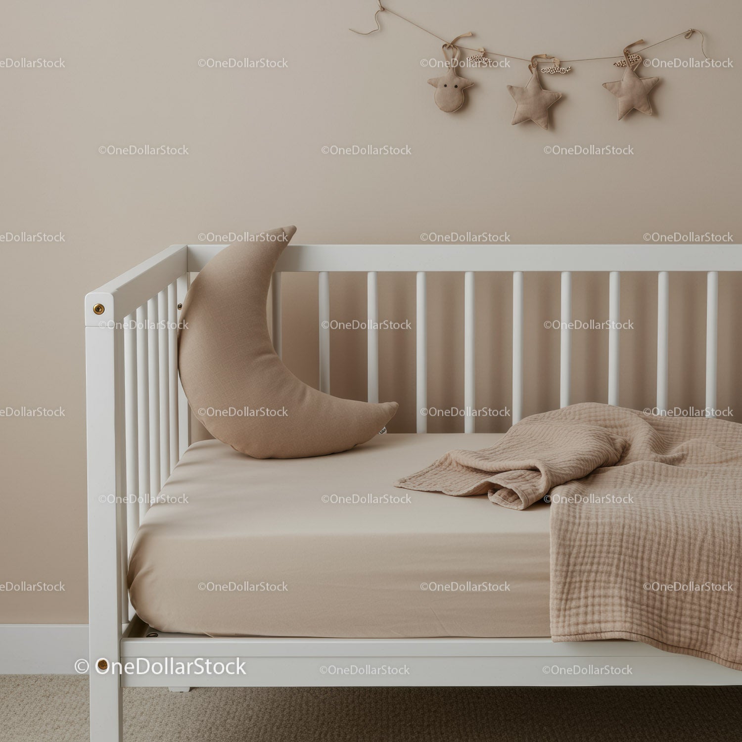 Minimalist toddler bed with cozy moon pillow and blanket